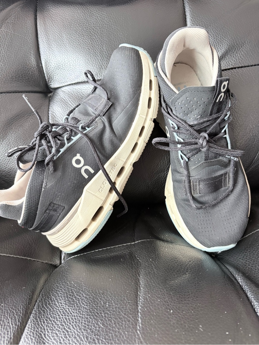 On Running Women's Athletic Shoes in Black, Cream and Light Blue